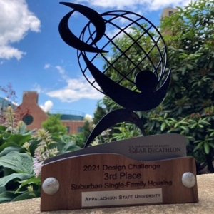 3rd place trophy for the Suburban Single Family Division of the 2021 Solar Decathlon Design Challenge